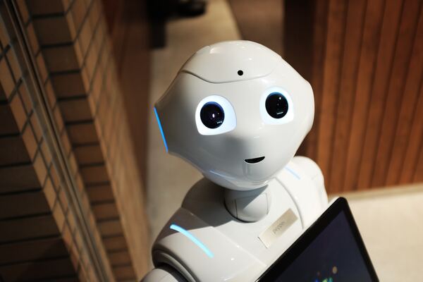 Overcoming The Uncanny Valley Through Shared Stressful Experience with a Humanoid Robot
