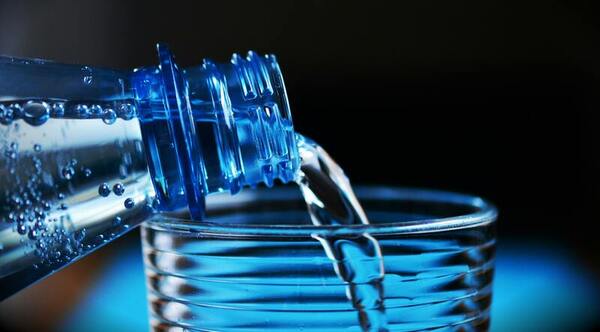 Mitigating microplastic exposure from water consumption in junior high students and teachers