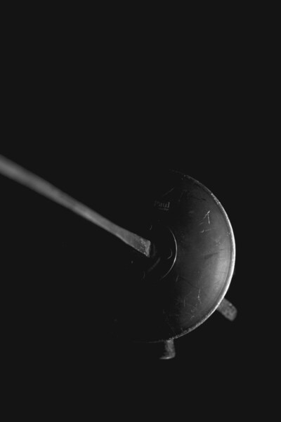 An analysis of the mechanical properties of fencing swords, and implications for weapon selection 